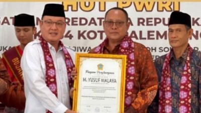 Yusuf Malaya Terima Penghargaan di HUT ke-64 PWRI Kota Palembang, Tegaskan PMPB Terus Mengabdi